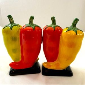 Clay art hot chili pepper salt and pepper shakers. Preowned